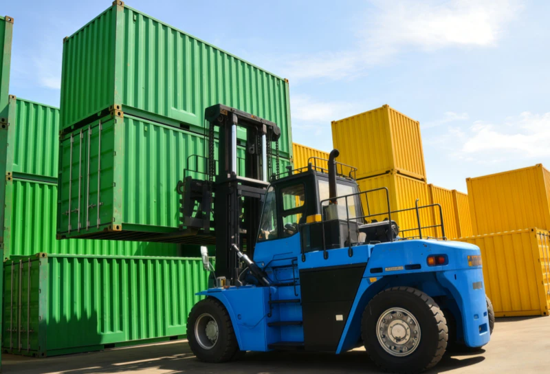 Heavy duty Forklift steering cylinder in action at a port freight handling facility